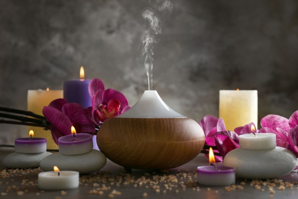 an diffuser with candles